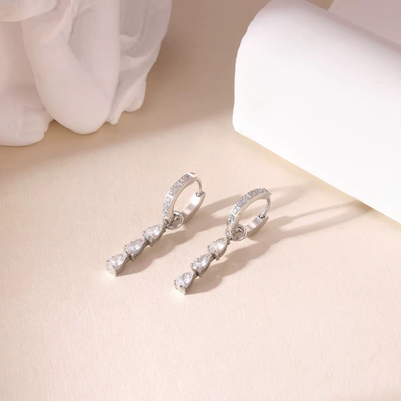 Reagan Silver Drop Huggie Earrings - David Omo